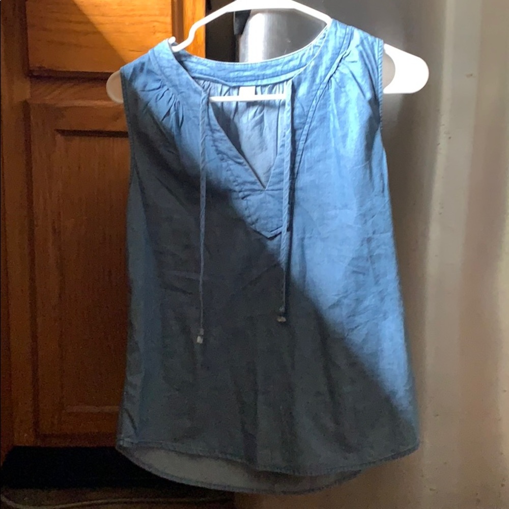 Tank top, shows cleavage